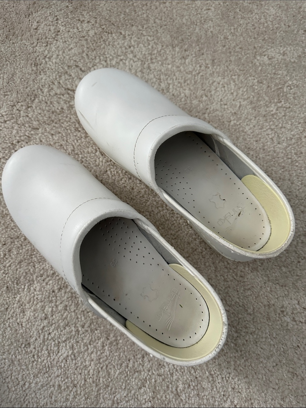 Dansko white nursing clog 39
